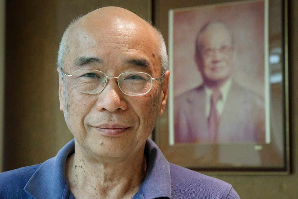 Lifelong learner, Raymond Ho, stands in front of his family friend and program's founder C.Y. Tung.