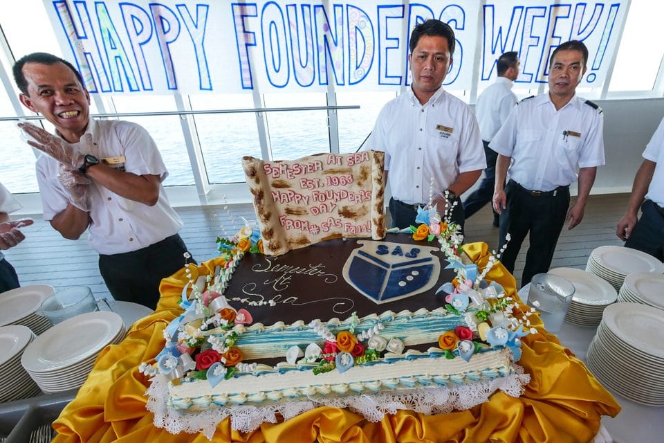 Crew Members Present the Cake