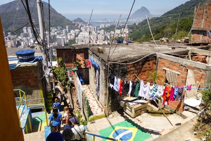 Students make their way through the favela, learning the community's history and challenges from their local guides along the way.