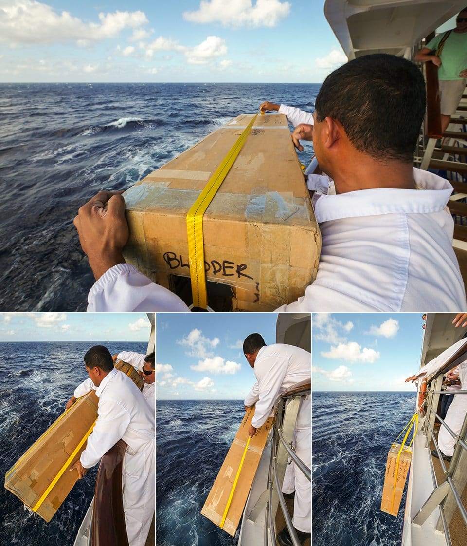 MV Explorer crew alongside Introduction to Oceanography students lower in the floats that were released after their departure from Barbados.