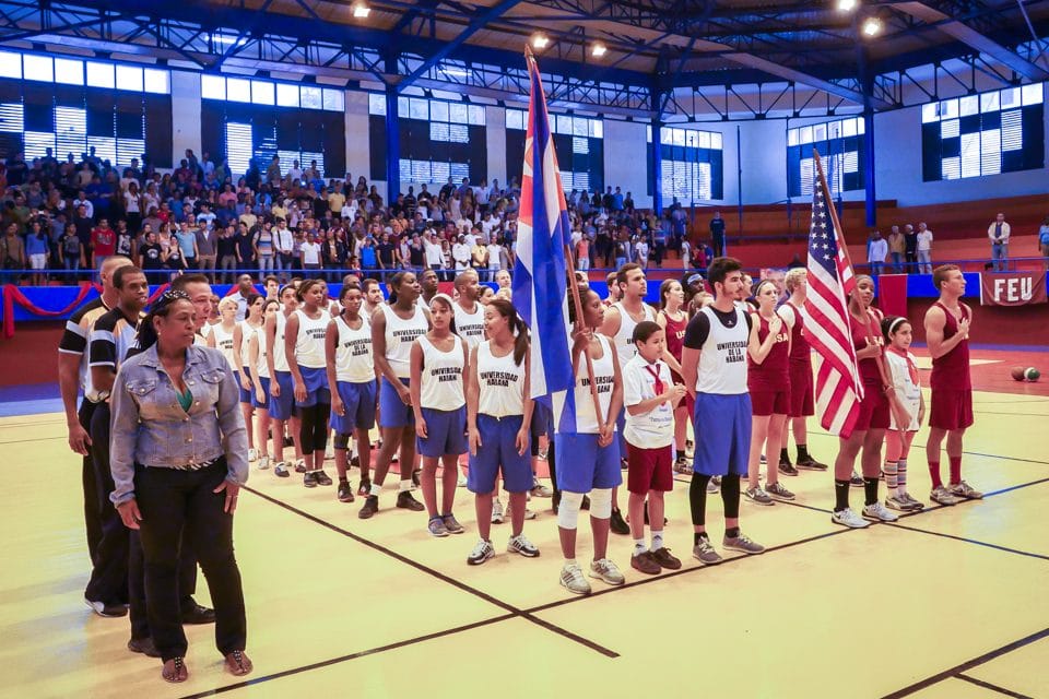 University of Havana and Semester at Sea students stand side by side at the start of the game as they play the Cuban and American national anthems.