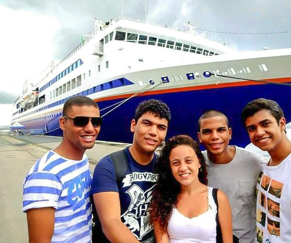 The youth ambassadors stand in front of the MV Explorer before transiting with the community from Rio de Janeiro to Salvador.