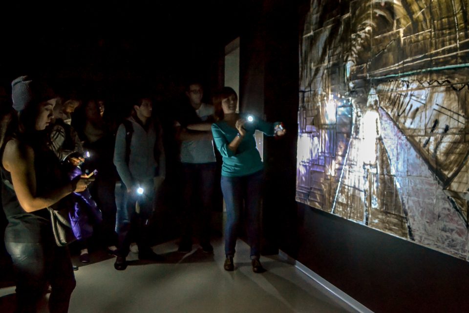 Museum docent Oxsana Kozlova guides students through the Erarta Museum after hours.