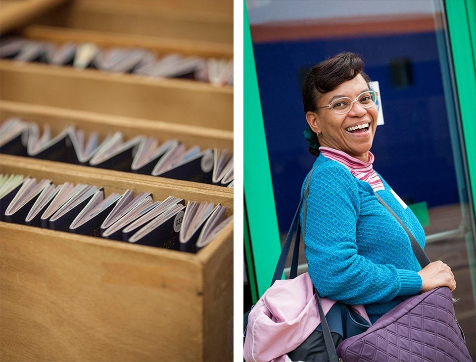 Passports are collected and numbered as the entire shipboard community boards. They are kept safe and organized for immigration into the 10 different countries the ship will visit this summer. At right, Lifelong Learner Sybil L. Holloway grins after she comes through the bright doors that led her to the first glance of the MV Explorer. 