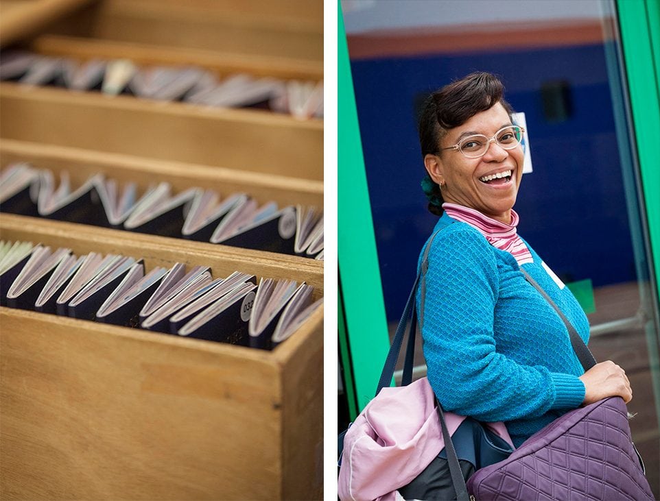 Passports are collected and numbered as the entire shipboard community boards. They are kept safe and organized for immigration into the 10 different countries the ship will visit this summer. At right, Lifelong Learner Sybil L. Holloway grins after she comes through the bright doors that led her to the first glance of the MV Explorer.