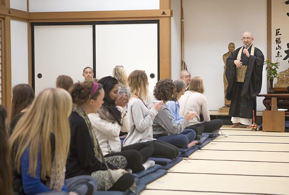 The Jikijitsu, or directing monk, answers questions after the Zazen sessions. 