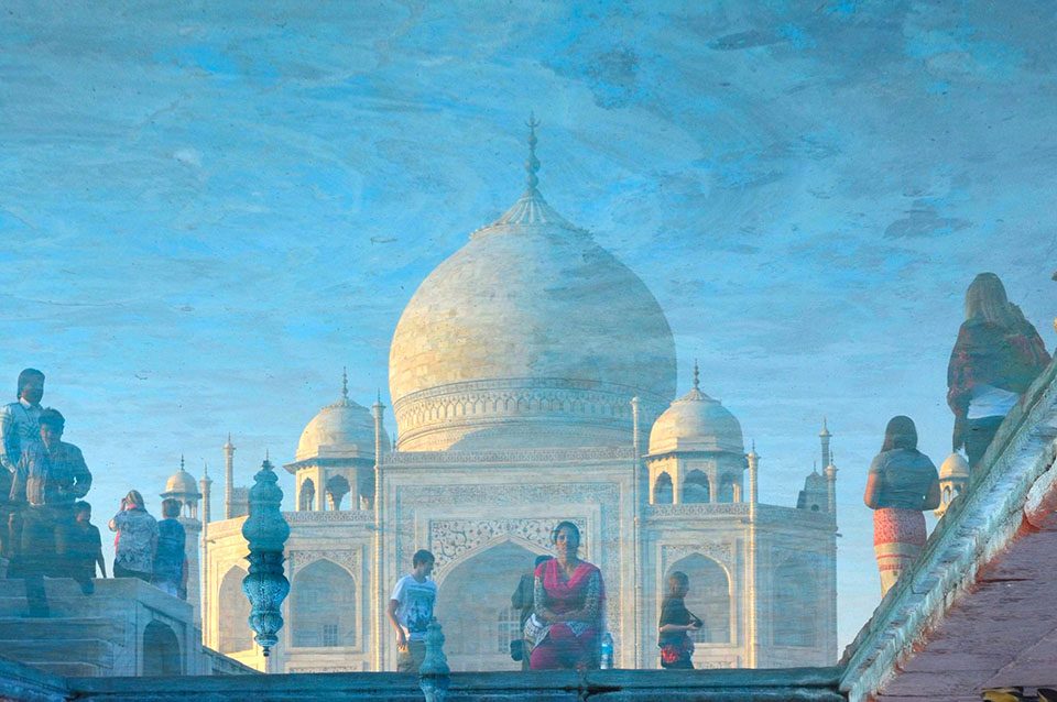 Gabriella Lutjen- Water reflection of Indian Women at the Taj Mahal