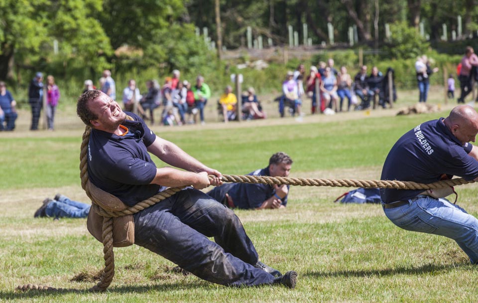 The Scottish 5 Man Championship Tug-O-War was a display of diligent patience and extreme brawn. Teams of five, mostly comprised of local construction crews battled against each other to gain even an inch. The second that one team would have a slight slip on the moist field, the other team would pick up the slack with as much force as possible. Only one man per team was allowed to have the rope around him, and the same man was the only one allowed to have more than just his feet planted into the field. 