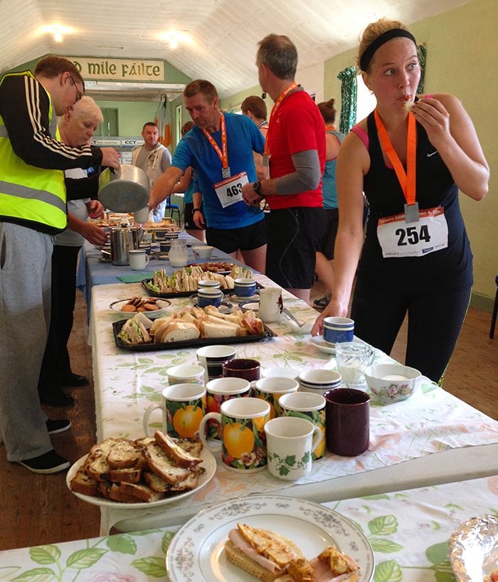 Kylie Beck, from the Illinois State University, enjoys Irish hospitatlity following her completion of the Moone 10K.