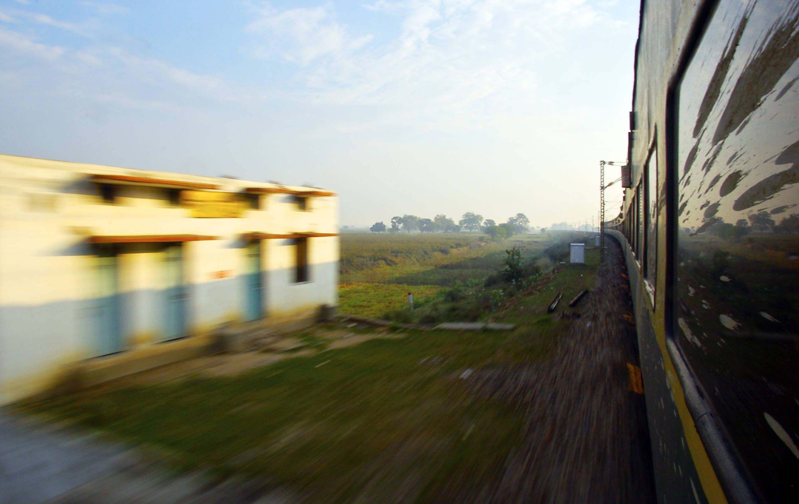 "This photo was taken during sunrise on an overnight train from New Delhi to Varanasi. The sun was rising from the opposite side and I thought it was interesting to see the dramatic shadow the train cast. The most difficult part was making sure my camera didn't venture too far out and get hit by the electrical poles whizzing by!" -Josh Liberman from the University of Miami