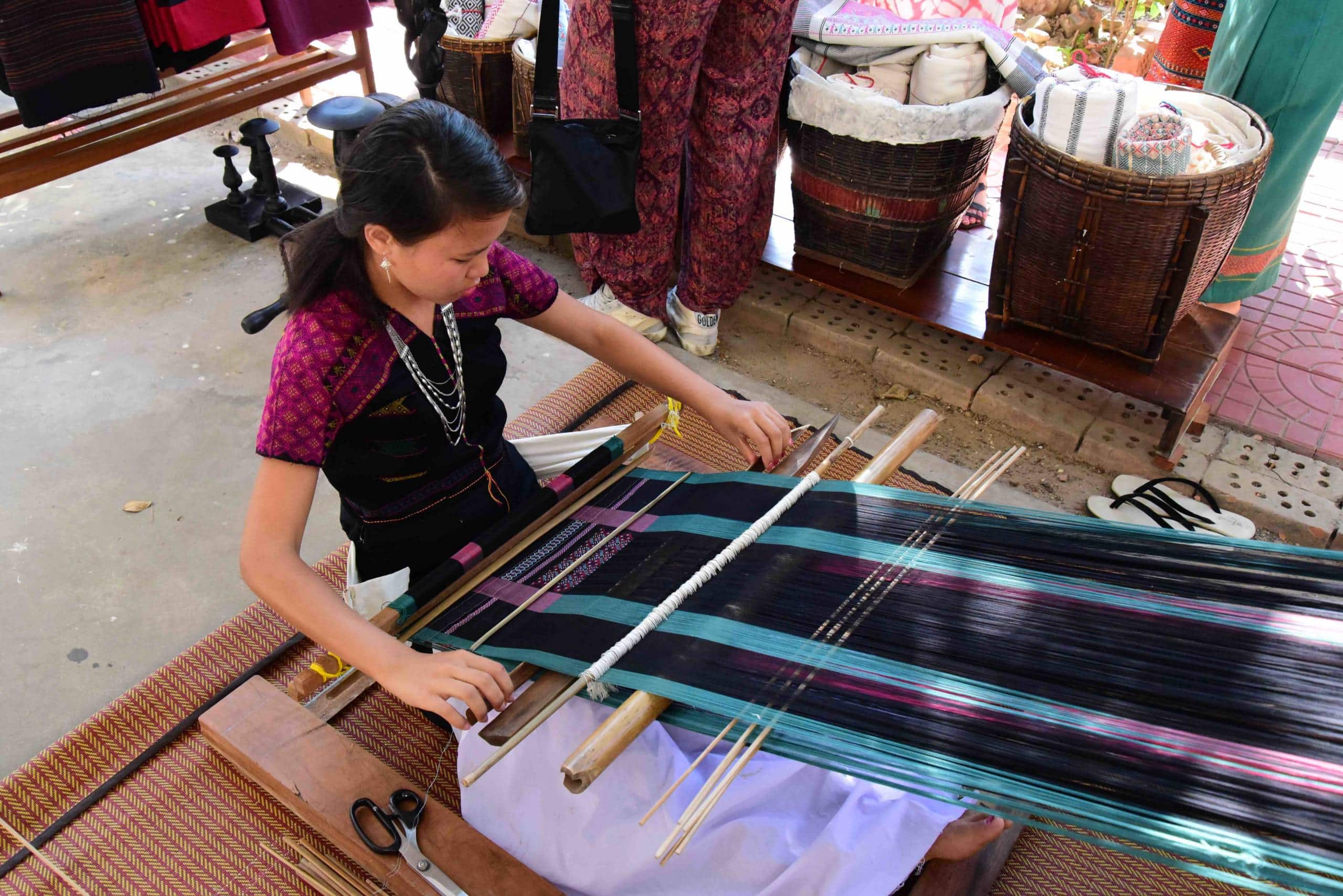Back strap loom used by Sone-Tu weaver