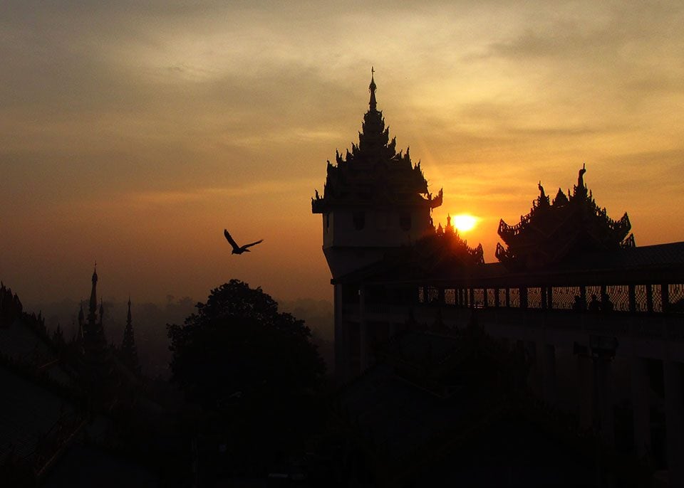 Seeing surise at a pogoda in Yangon