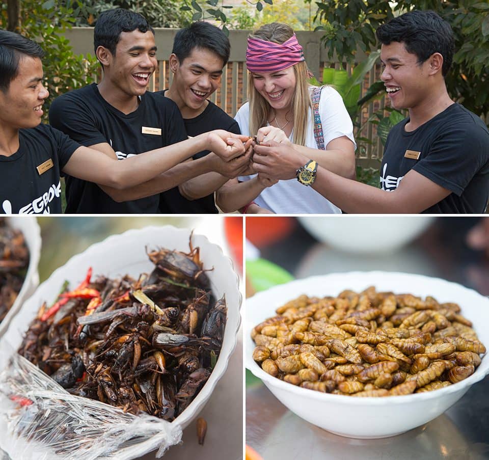 Taylor Roesch of the University of Dayton tries some traditional Cambodian snacks with EGBOK students.