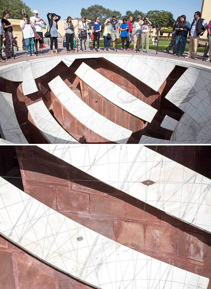 The Jai Prakash Yantra is made up of two spherical cavities in the ground that are a map of the night sky. Wires are attached north/south and east/west and in the center is a plate with a hole in the middle. Seeing where the sun shines through the hole and hits the sphere shows the sun's latitude, longitude, and the sign of the zodiac. 