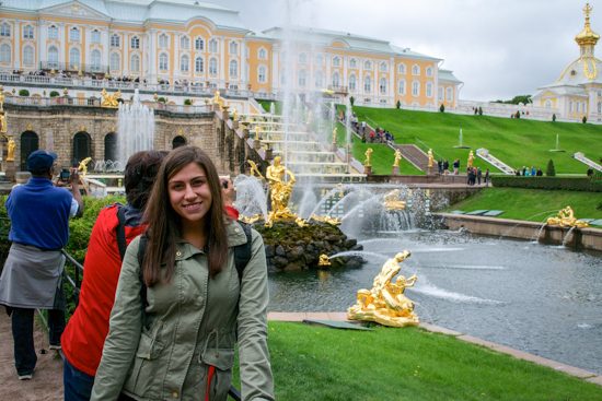 Jessica DePeppo, student from Ithaca College, stands in front of Peterhof in the Fall 2014 voyage's first port of Saint Petersburg, Russia.