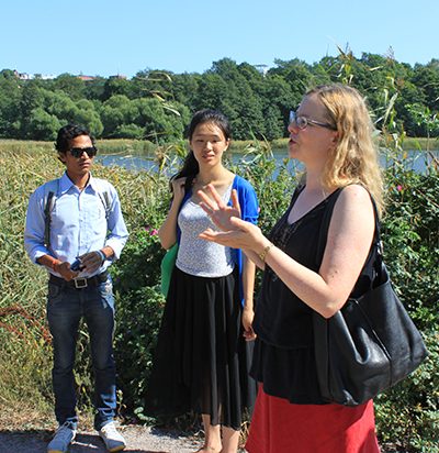 Maria Jaakola speaks to students in front of T Bay.