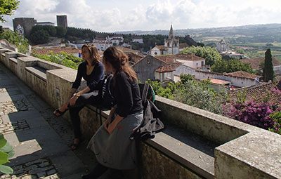 Dr. Prista and student Jenna Trizzino rest for a moment along one of the walls that surround Obidos.