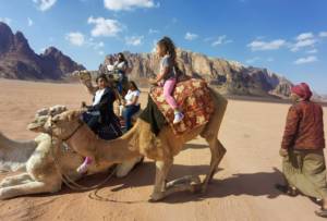 Valentina rides camel in Jordan