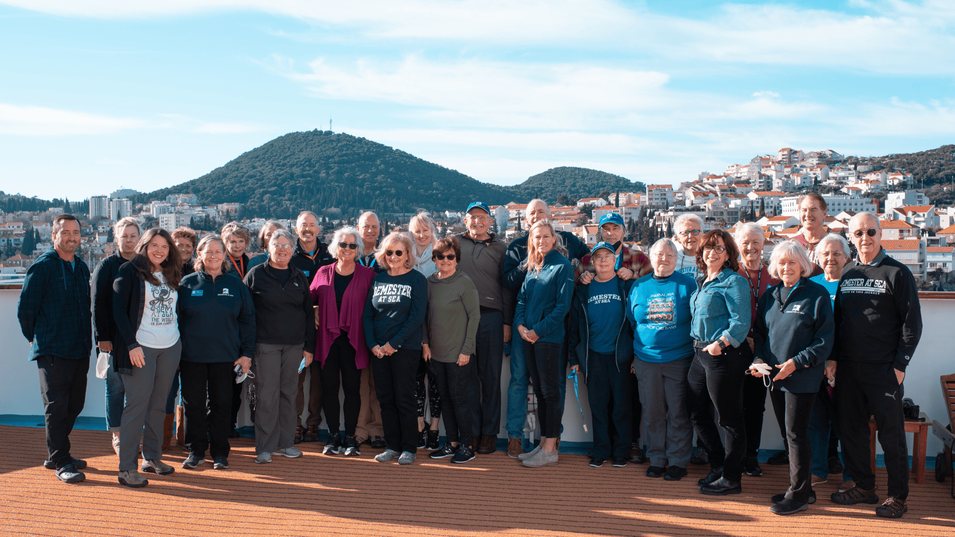 Lifelong Learners pose for group photo on SP22 Voyage