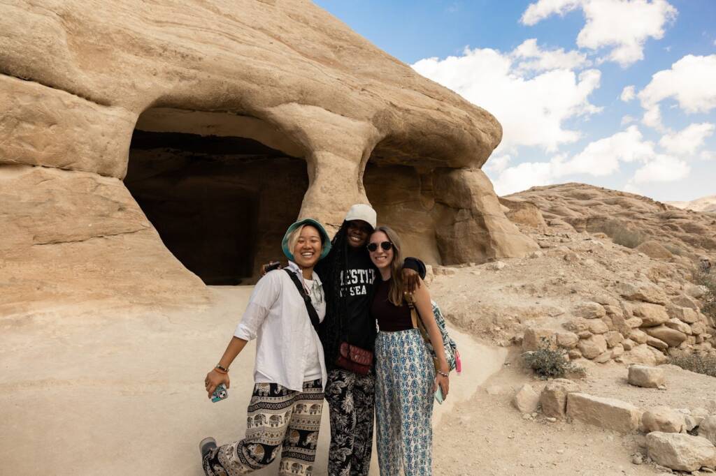 Three women at a site in Jordan.